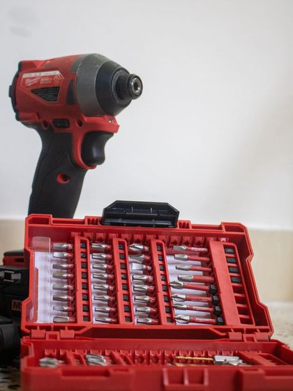 A real power drill and a full set of driver bits. We believe in using real-world tools to teach real-world skills.