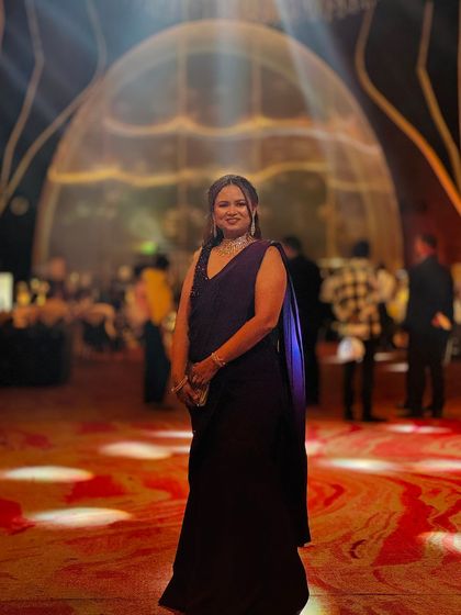 Another beautiful shot of the client's elegant long braid, a timeless choice for a saree look.