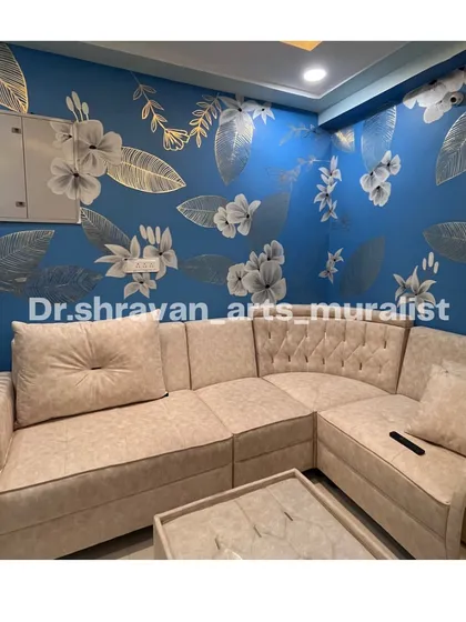 Even in a smaller space, a gold and silver foil floral mural can make a big statement. This one, done in Mumbai, wraps around a cozy seating area.