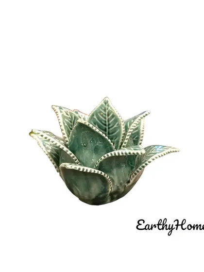 A side view of the leaf-design tea light holder.
