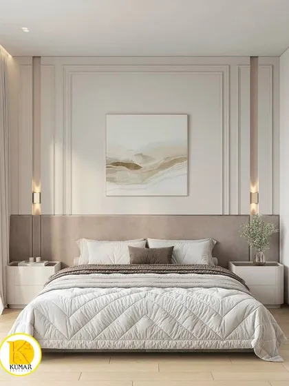 A front view of the bed, showcasing the symmetrical design with elegant wall sconces and matching nightstands.