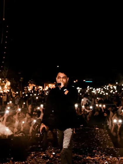 Another shot from the JIMS Delhi campus tour, with the crowd fully engaged. The combination of music, lights, and smoke creates an immersive experience.