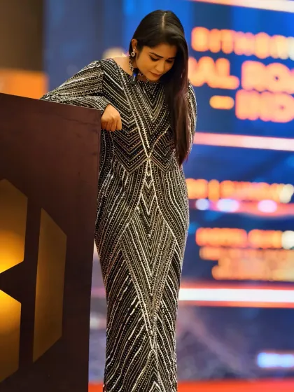 Taking a quiet moment by the podium before the awards begin. For me, preparation is key to delivering a flawless experience that honors the hard work of every individual being recognized.