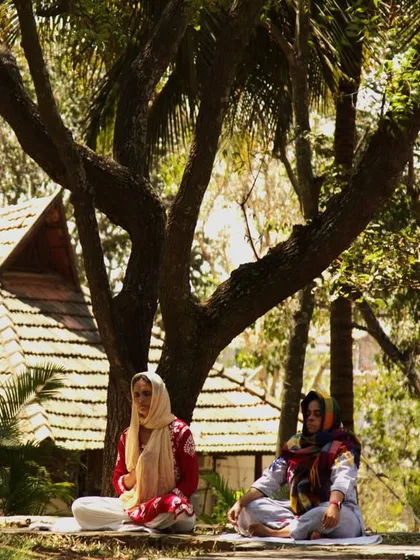 Guests find serenity in meditation under our sacred Neem and Peepal trees. Practicing mindfulness in nature, especially during the auspicious time of Maha Shivaratri, deepens the connection to your inner self and the divine.