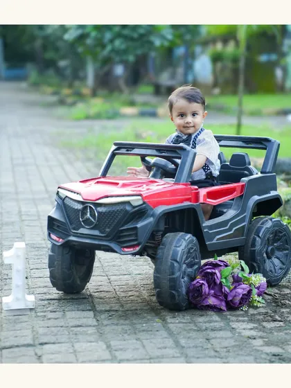 Ready to ride into his first year! Using fun props like this toy car for a pre-birthday shoot adds a playful element that kids absolutely love.