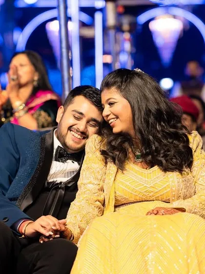A quiet moment of connection for the couple amidst the Sangeet celebrations. These are the memories that last a lifetime.