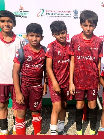 Part of the young Somaiya FC team posing after their victory at the DUSF Grassroots Football Fiesta.