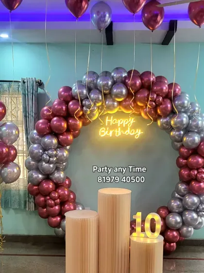 Another view of the 10th birthday party, showing the helium balloon bunches.