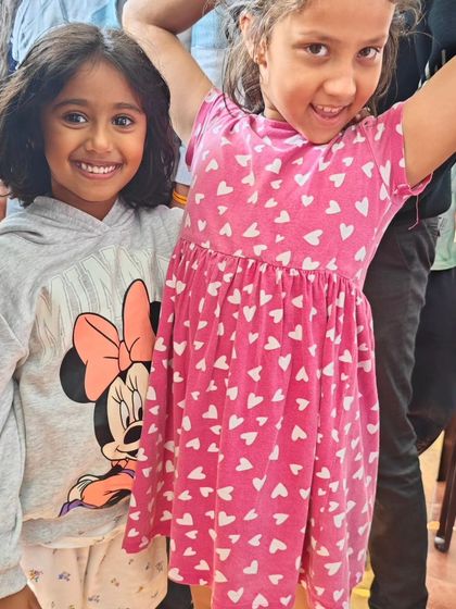 More smiles from our supporters. A swim meet is a full day event, and the energy from friends and family keeps our swimmers going.