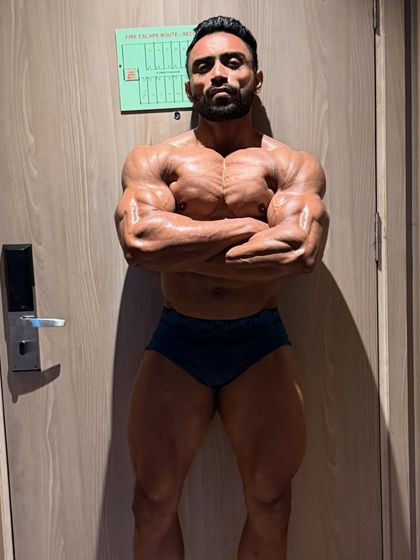 Posing in my hotel room before the competition. The focus is intense.