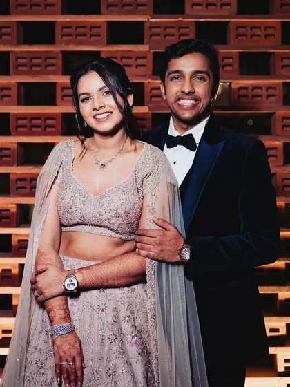 The happy couple. Shilpi's classic, minimal sangeet look is a testament to the idea that less can be more, even for a grand celebration.