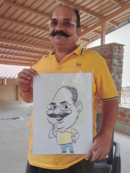 This guest's impressive mustache was a fun feature to draw in his caricature.