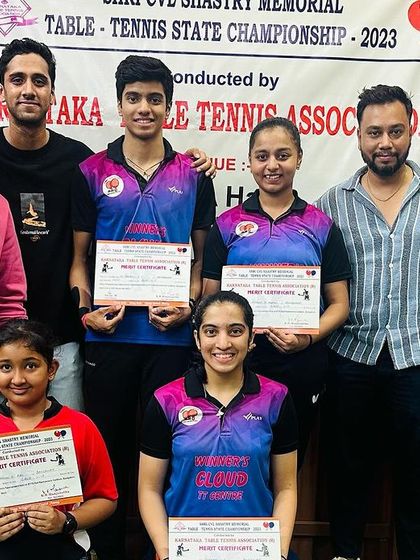 The team celebrates a successful Karnataka State Championship 2023, with multiple winners and podium finishers posing with their certificates and coaches.