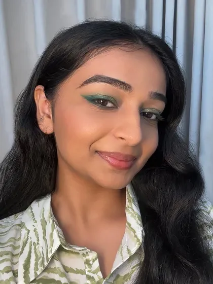 A pop of color with this glittery green winged eyeliner. This is a personal look I created to show how a simple touch of glitter can elevate your makeup.