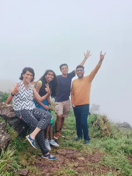 Making funny faces and peace signs on a foggy hilltop in Chikmagalur. It's all about having fun and not taking ourselves too seriously.