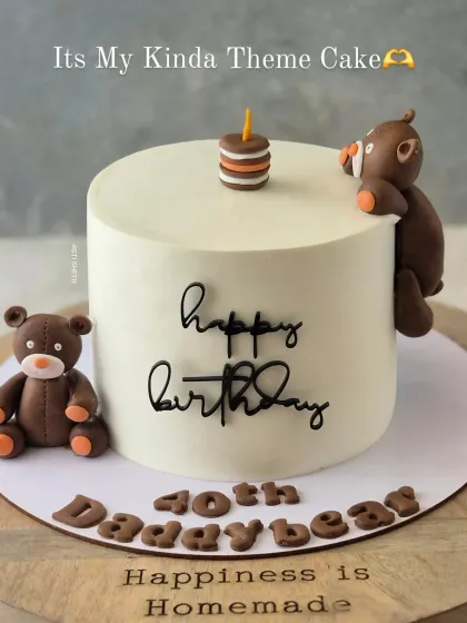 The "Daddy Bear" cake on a wooden board that reads "Happiness is Homemade," reinforcing my core belief.