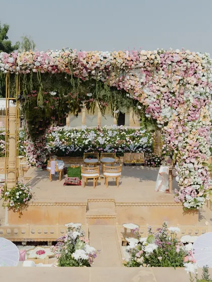 A mandap should feel like a sanctuary. For this pastel-themed ceremony at Suryagarh, we created a breathtaking floral arch that felt both grand and intimate. Using layers of soft pinks, gentle pastels, and lush greens, we designed a space that was a breath of calm, allowing the couple's vows to be the true centerpiece.