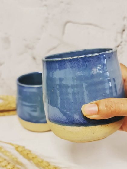This handmade ceramic mug in a brilliant blue is the perfect way to enjoy everything from coffee to wine. All my pieces are made with food-safe materials and non-toxic glazes.