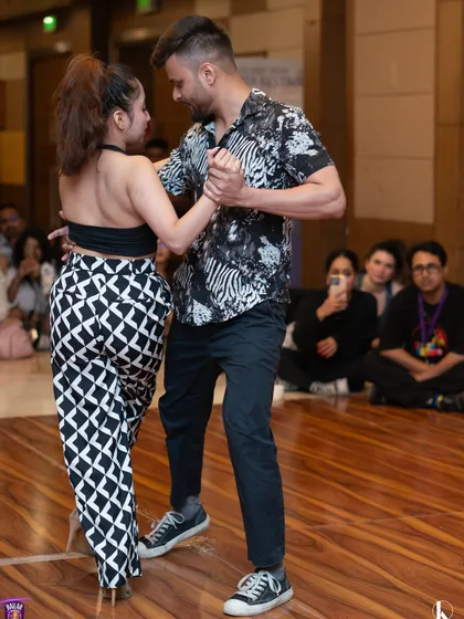 The focus and dedication of our dancers are on full display during the Kizomba competition. We train our students to perform with confidence and passion.