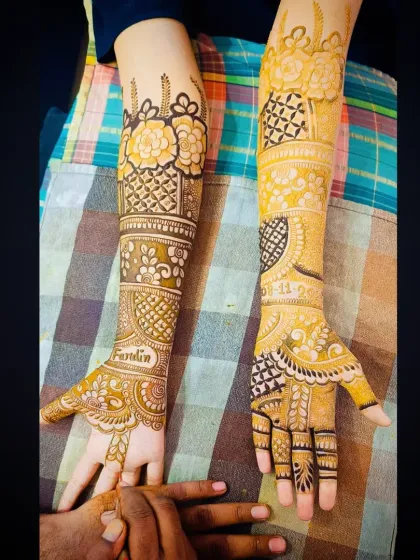 The full view of the personalized "Fardin" mehandi, showing how the name and date are seamlessly integrated into the traditional patterns.
