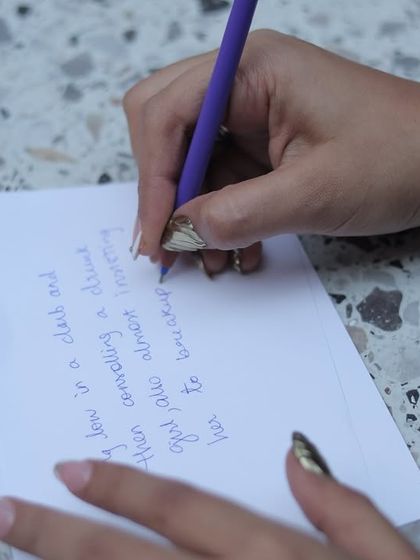 A guest writing a heartfelt note. I believe in creating moments for quiet reflection and love amidst the fun and games.