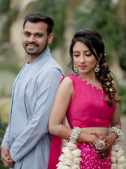A stylish portrait of the same couple from their Sula Vineyards session. This shot shows a more posed but still relaxed interaction, highlighting their beautiful traditional outfits.