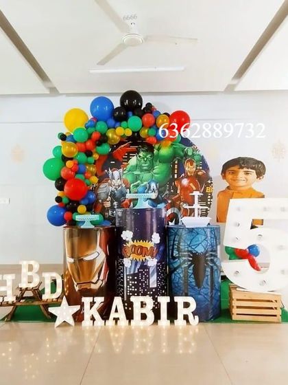 An Avengers Assemble theme for Kabir's 5th birthday, with plinths themed as Iron Man, Captain America, and Spider-Man.