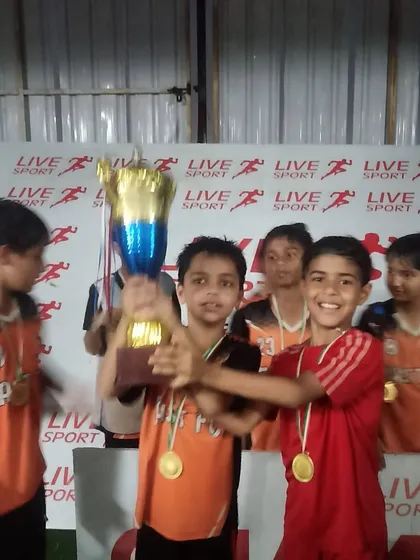 Two of our U9 players celebrating their championship win together.
