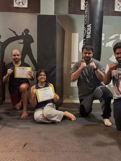 A group of warriors who have just leveled up. They have demonstrated their proficiency in Krav Maga techniques and are ready for the next stage of their training.