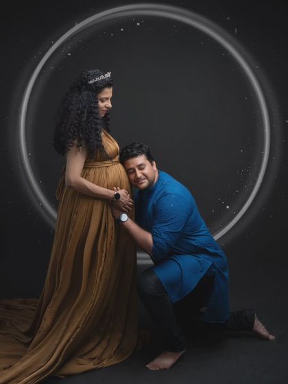 A moment of pure love and anticipation. This portrait captures the tender emotions between a couple as they prepare to welcome a new love into their world.