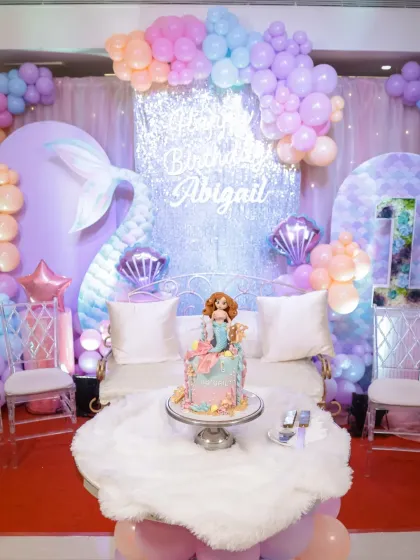 Here is the finished mermaid cake in its element, taking center stage at Abigail's beautiful first birthday party. Seeing my creation as part of such a stunning setup is one of the best feelings.