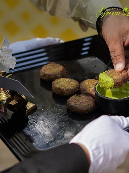 These Hara Bhara Kebabs are a healthy and flavorful option. Made with spinach, peas, and potatoes, they are pan-fried and served with a zesty green chutney for the perfect bite.