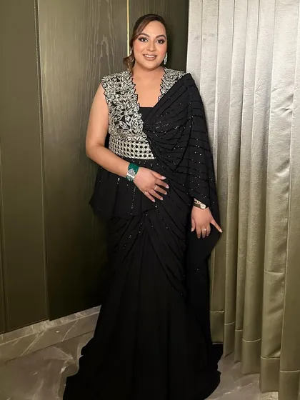 The full view of this cocktail-ready look. The makeup is designed to be elegant and sophisticated, perfect for a black-tie event.