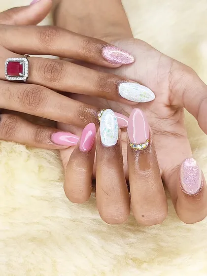 Another view of this elegant pink and glitter manicure, perfect for a party or special occasion.