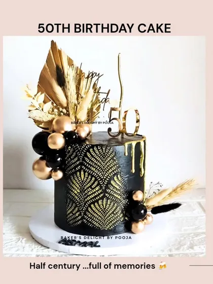 A glimpse of a 50th birthday cake, showcasing a bold black and gold design that is perfect for celebrating a half-century of memories.