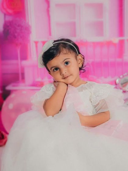 A pensive and adorable moment captured during the Barbie shoot. Even the quiet moments are beautiful.