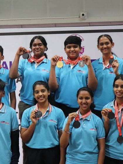 A proud group of our Air Rifle medalists from the sub-youth and junior women's teams, celebrating their ISSF medals at a state competition.