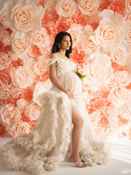 A side view of the magnificent flower wall setup, showing the scale and romantic feel of this popular backdrop.
