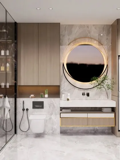 We design bathrooms that feel like a personal spa. This project combines a walk-in glass shower with black marble, light wood cabinetry, and a cleverly integrated laundry station, blending luxury with everyday practicality.