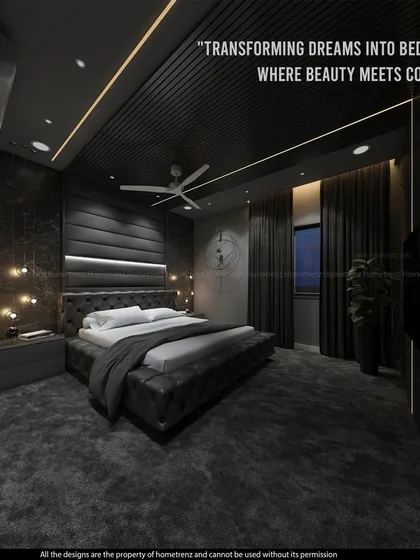 Transforming dreams into bedrooms where beauty meets comfort. This dark-themed master bedroom uses a padded headboard, textured walls, and strategic lighting to create a dramatic yet comfortable space.