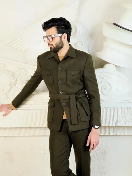 The olive green belted co-ord set, viewed from the side, showcases its unique design and flattering, structured fit.