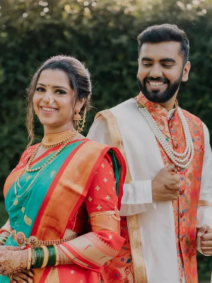 A classic couple portrait. The bride's traditional attire and radiant makeup make for a picture-perfect memory of their special day.