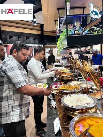 I believe in creating a grand impression. This extensive buffet setup for a corporate event at Häfele showcases our capability to handle large scale gatherings with elegance and an abundance of delicious options.