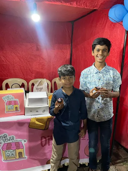 Two more happy customers at my Children's Day pop-up. Nothing beats seeing them enjoy their hand-decorated donuts.