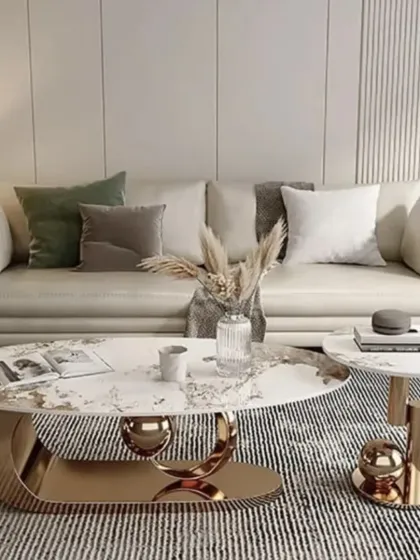 I believe furniture should be a piece of art. This sculptural center table set, with its marble top and gold-finish metallic base, serves as a stunning focal point in any modern living room.