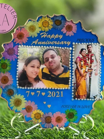 An anniversary frame that tells a story. This piece includes two photos, one from the wedding and a more recent one, to celebrate the journey of love over the years.