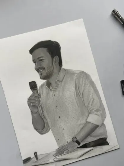 A finished A4 sketch of a man speaking into a microphone. I focused on his happy expression and the details of his patterned shirt.