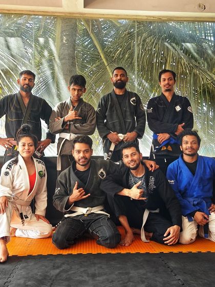 The Gi team posing after a solid training session. You can see the camaraderie and shared passion for the art.