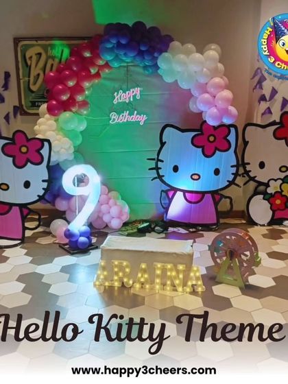 This is another angle of the Hello Kitty party, showing how the different lighting colors interact with the decor. The setup is designed to be visually dynamic and create a fun party atmosphere.