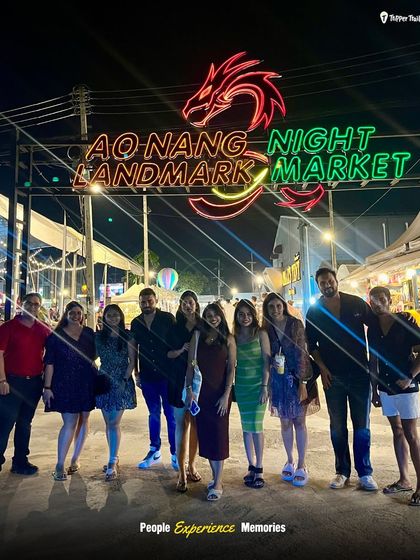 Exploring the Ao Nang Night Market in Krabi. It's the perfect place to grab some authentic Thai street food, shop for local crafts, and just soak in the local vibe with the group before another night of adventure.